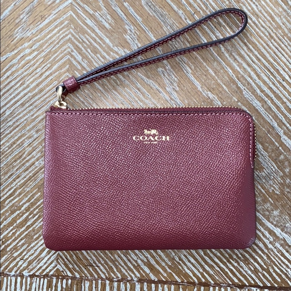 NWT Coach wristlet (wine)